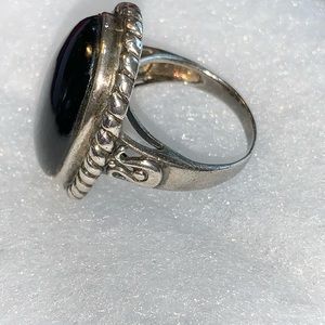 Ladies black stone ring.